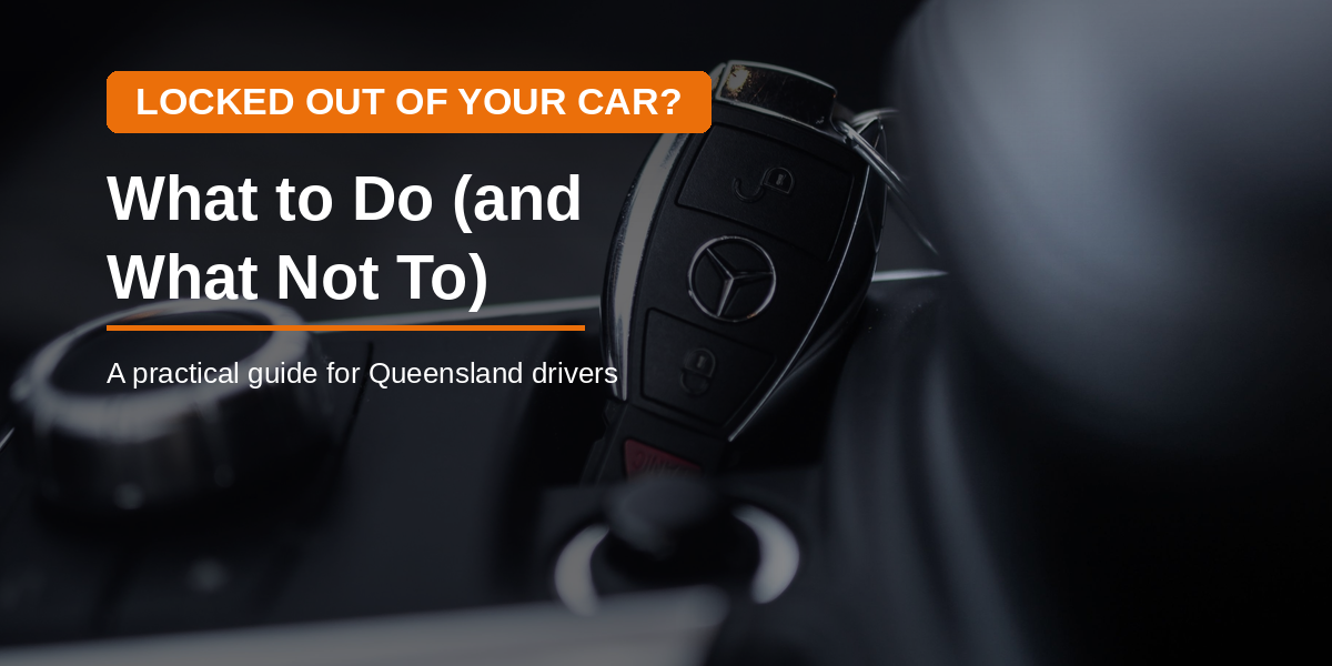 Car keys visible locked inside a vehicle through the driver's side window